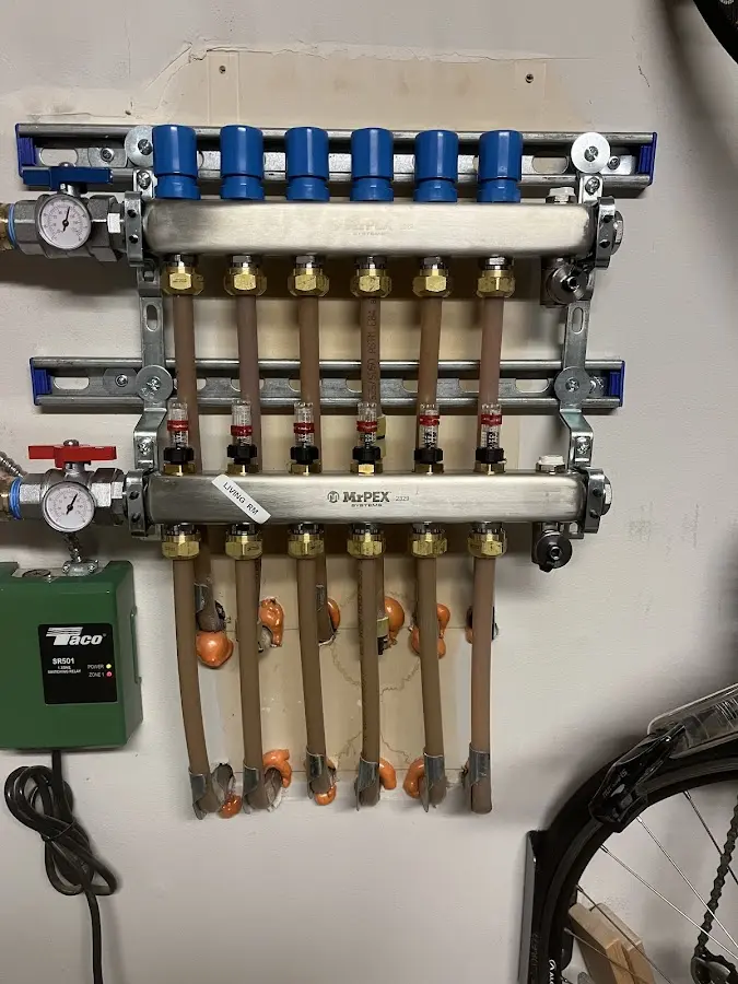 Plumber performing Water Heater Repair at a residential property in Twin Falls